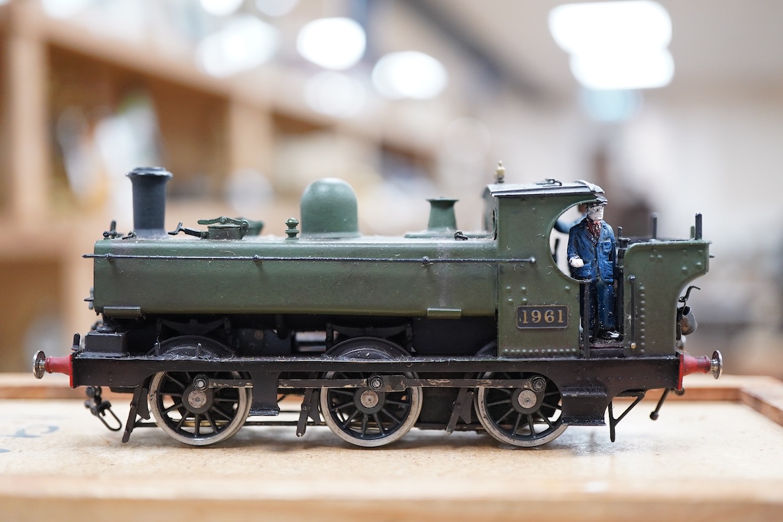 Two EM gauge scratch built model railway GWR locomotives by John Worsley, an 0-6-0PT, 1961, and an 0-6-0ST, 2007, both detailed models with opening smoke box doors showing the details of the blast pipe and boiler tube en